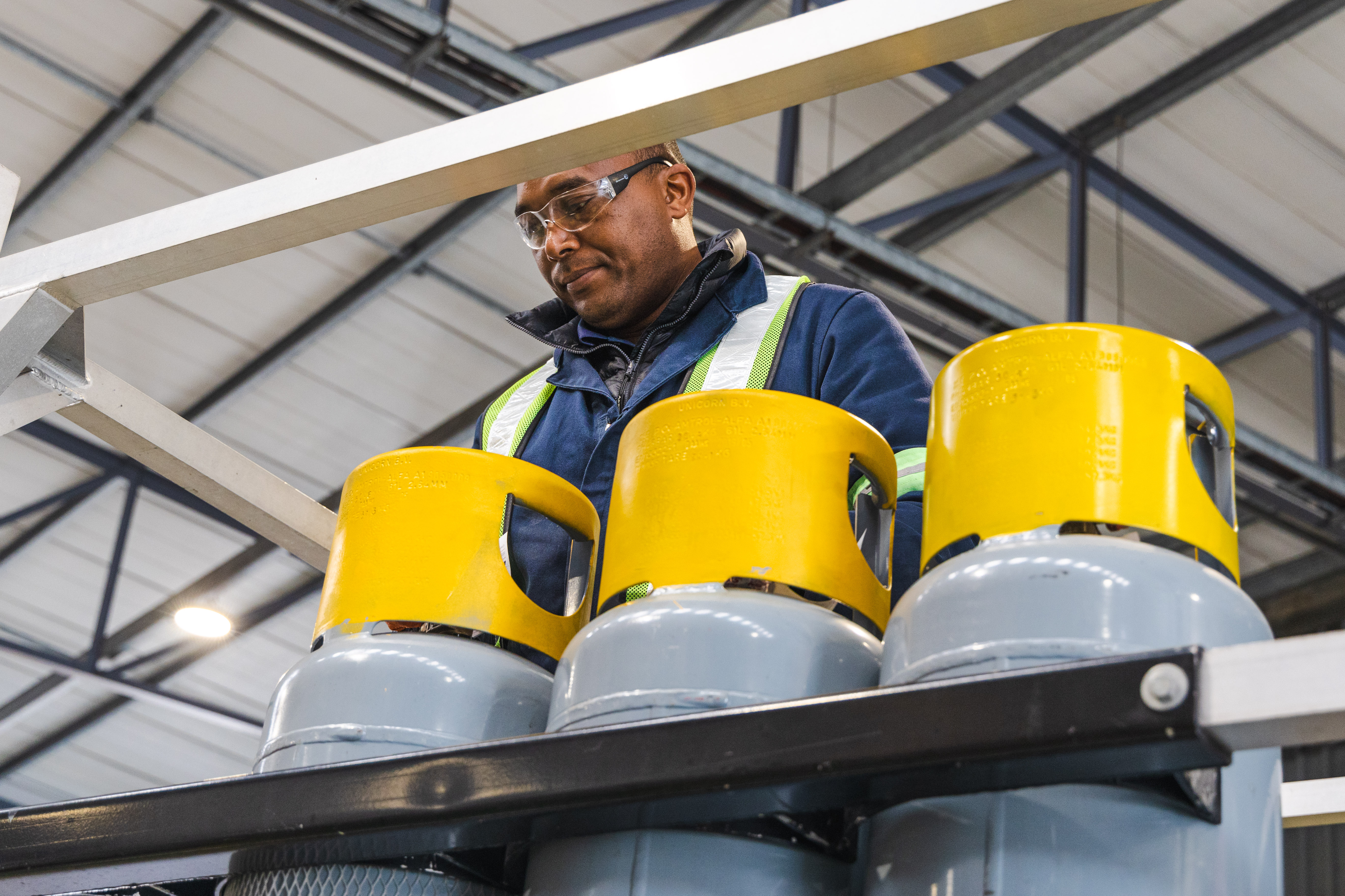 Technician working on cylinders