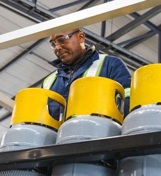 Technician working on cylinders