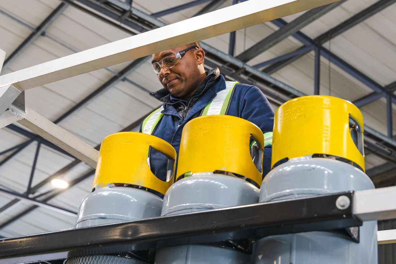 Technician working on cylinders