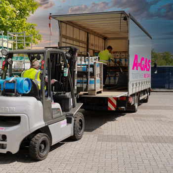 Operator On Forlift Filling Lorry