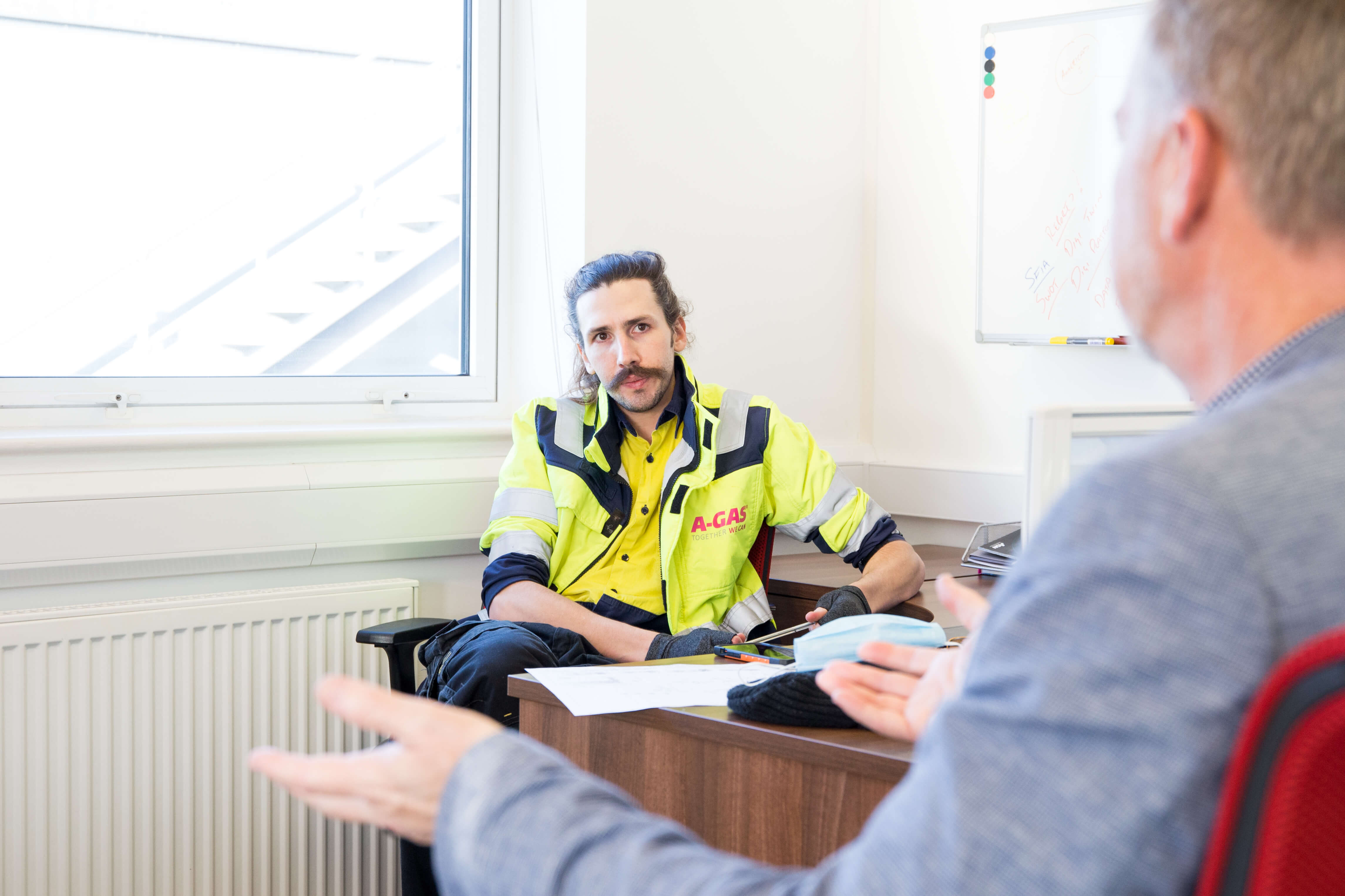 People Talking In A Meeting