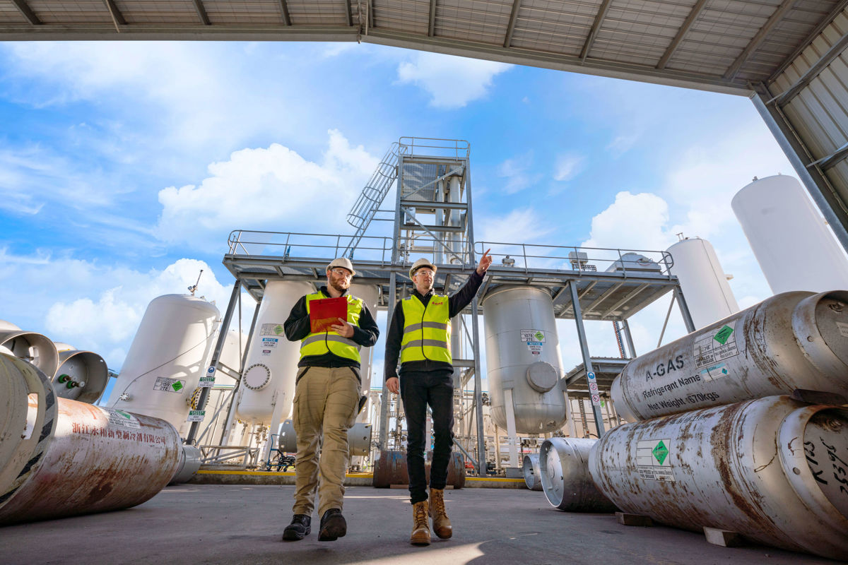 Technicians Walking Through Site
