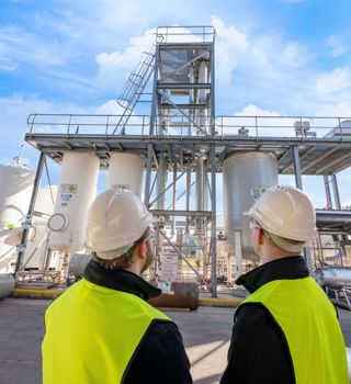 Technicians Looking at Separators