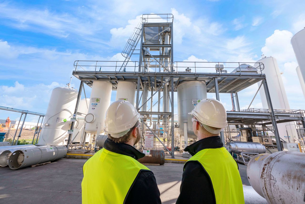 Technicians Looking at Separators