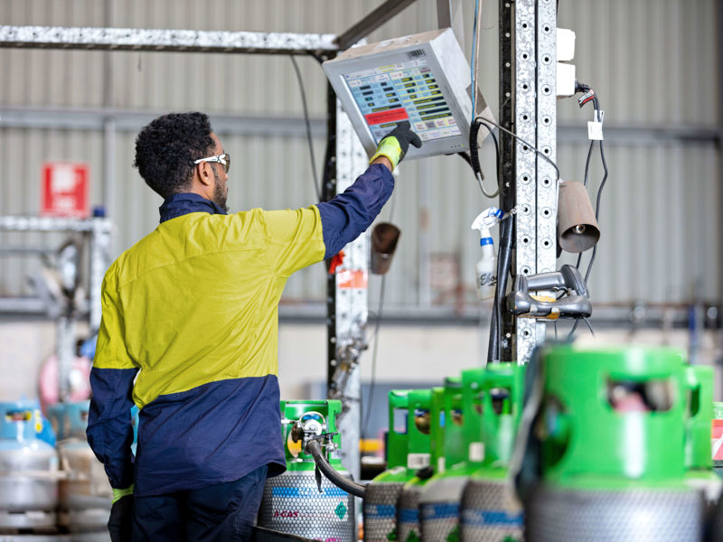 Person Filling Cylinders 2 - Photoshoot 2022